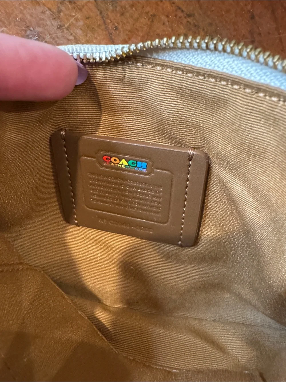 Coach White Pebbled Leather Wristlet with Rainbow Coach Logo